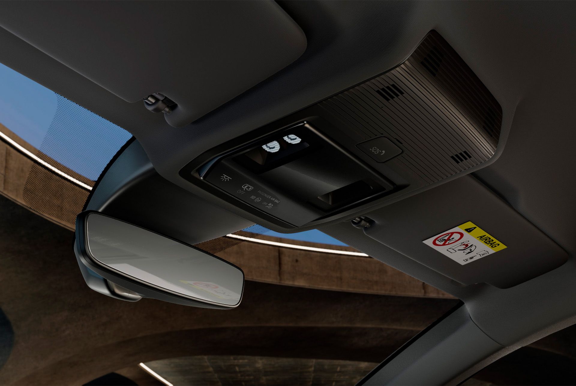 Vista interior do novo cupra leon sportstourer mostrando a consola superior com um espelho retrovisor, luzes LED do habitáculo, vários comandos e funcionalidades de conetividade cupra, incluindo um botão de emergência SOS.