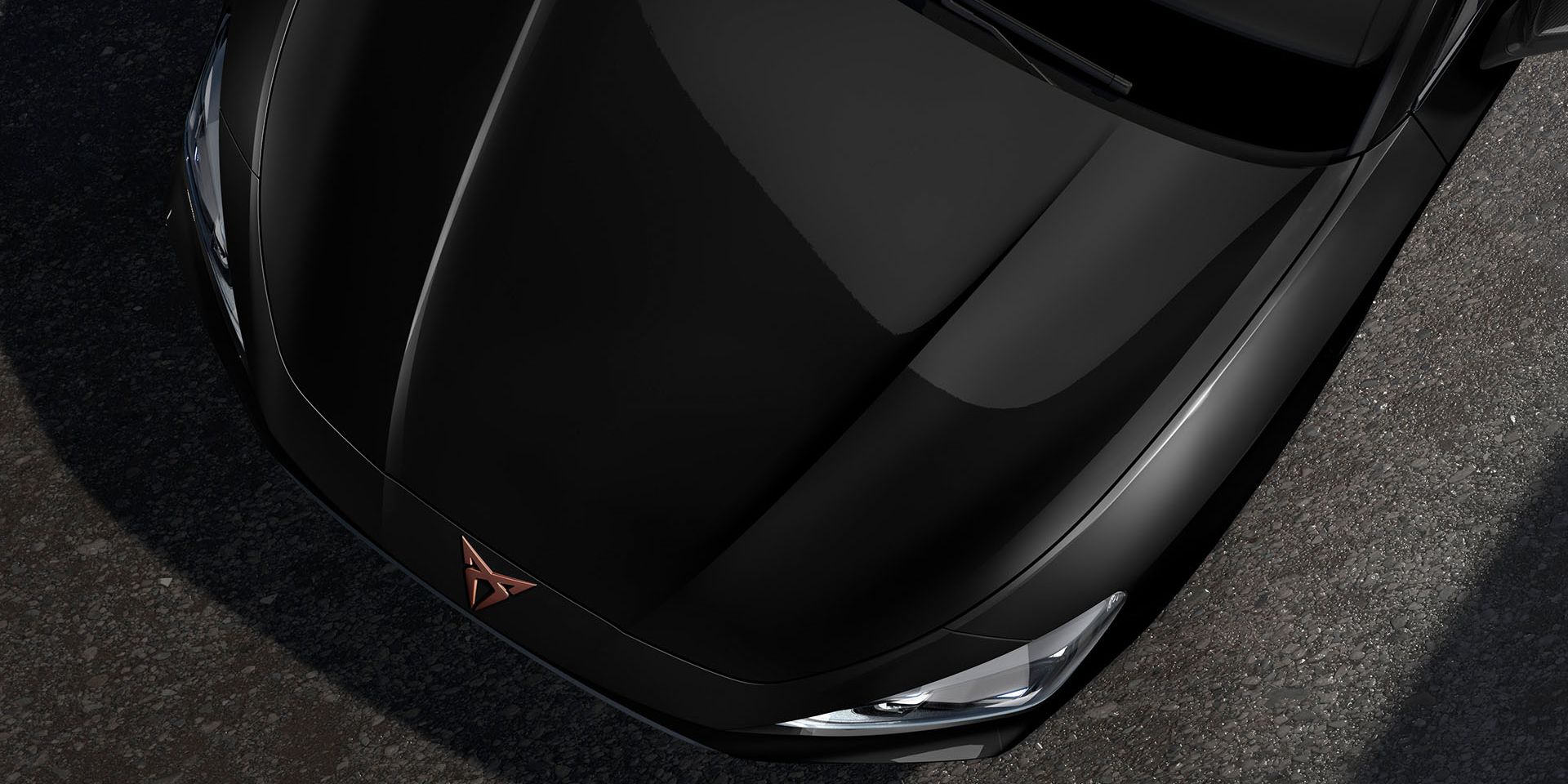 bird’s eye view of a midnight black new Cupra Leon 2025 car hood.