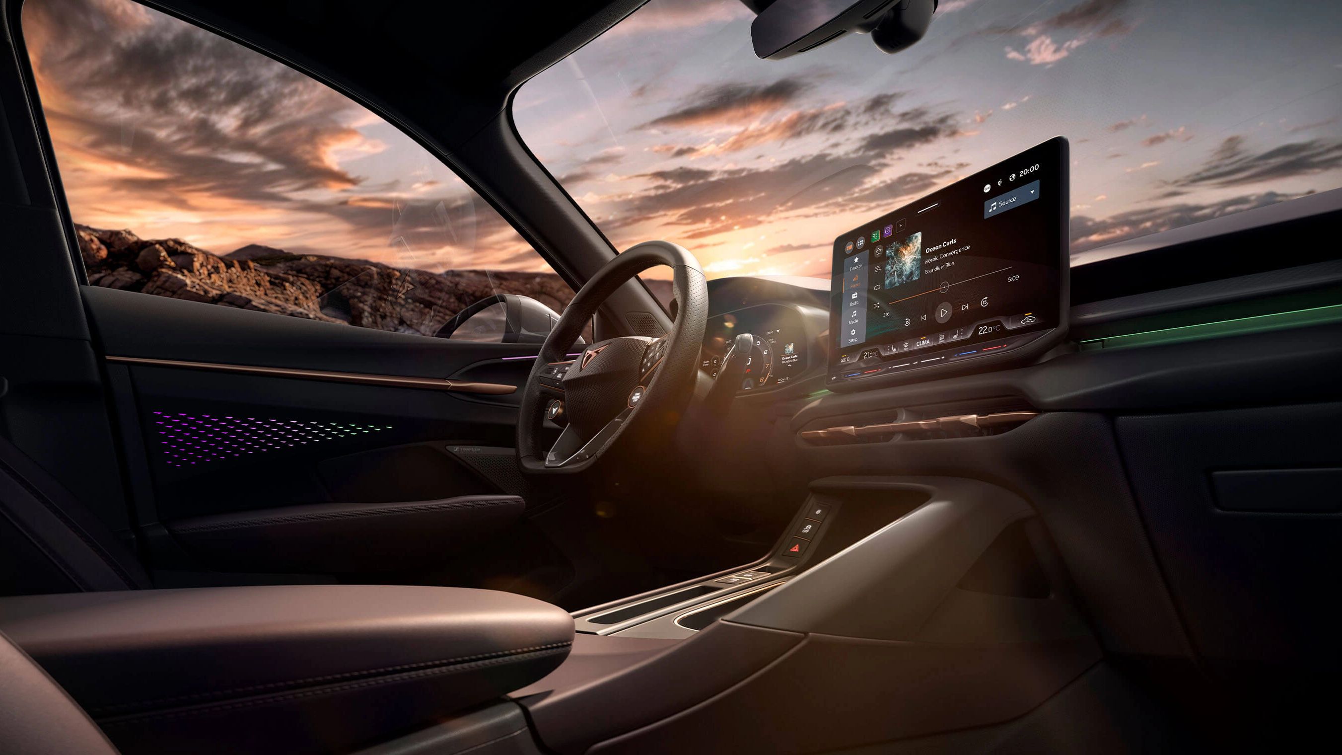 Terramar VZ PHEV, viatura de empresa, interior com estofos em couro High Canyon, sistema de infotainment e pôr do sol.