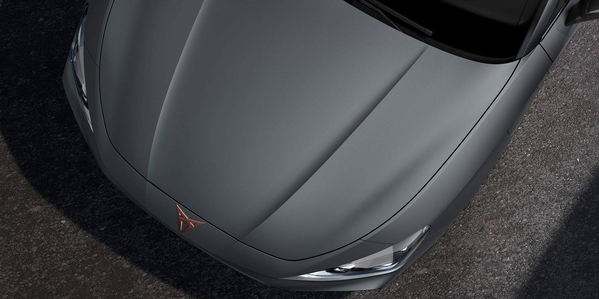 bird’s eye view of an enceladus grey matt new Cupra Leon 2025 car hood.