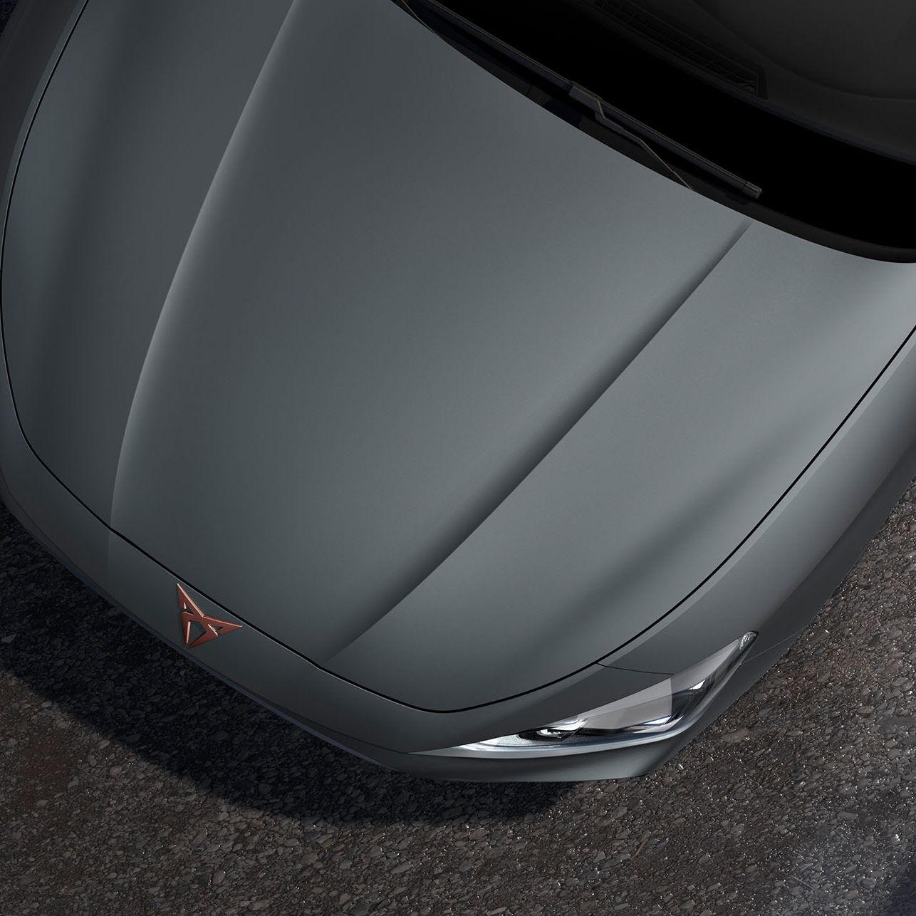 bird’s eye view of an enceladus grey matt new Cupra Leon 2025 car hood.