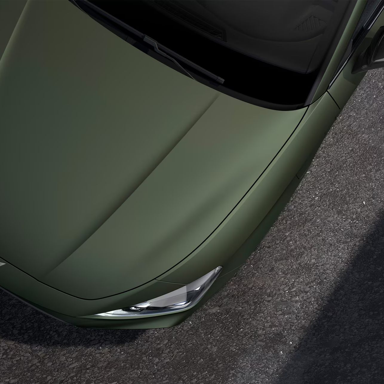 Vista aérea do capô do novo CUPRA Leon Sportstourer 2025 em Verde Manganese Mate.  